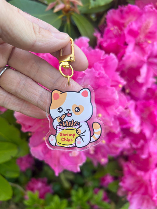 Cat eating shrimp chips acrylic key chain